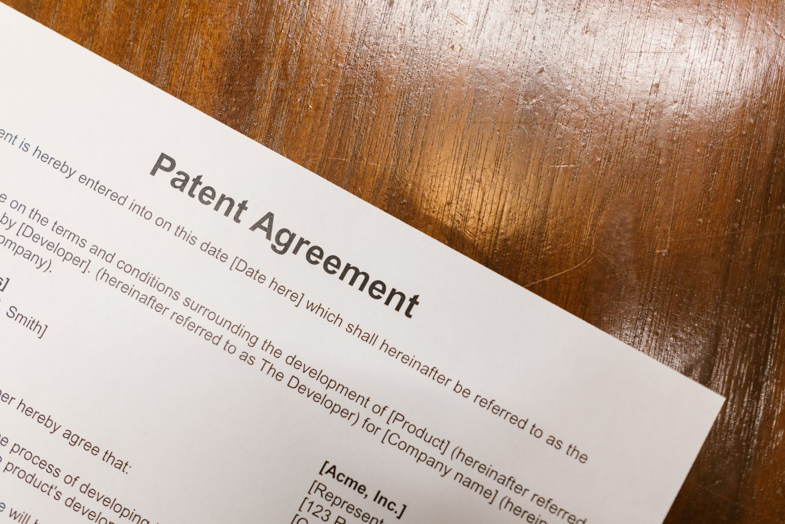 Patent agreement contract on a desk